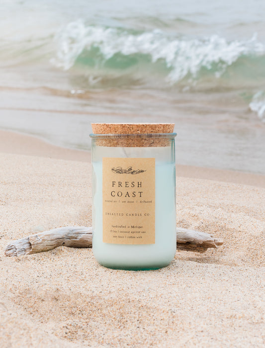 Fresh Coast Michigan candle by Unsalted Candle Co. with mineral air, wet stone and driftwood, inspired by the Great Lakes shoreline