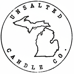 Unsalted Candle Co. circular stamp logo on white background